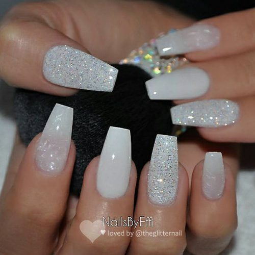Cute coffin shaped light grey acrylic nails with glitter design!