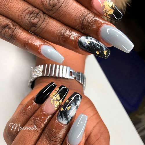 Cute gray and black nails coffin shaped with gold foil and accent marble nail!