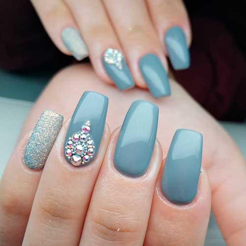 Cute gray coffin nails with glitter accent nail and rhinestones! Cute gray coffin nails with glitter accent nail and rhinestones!