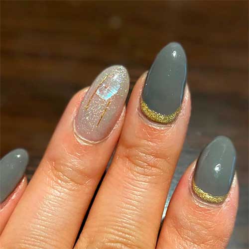 Cute gray nails with gold glitter round shaped!