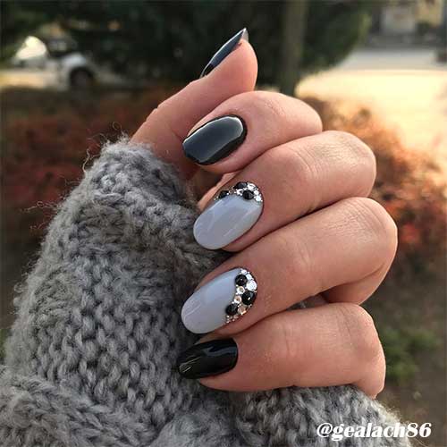 Cute round black and grey nails with rhinestones! - winter nails