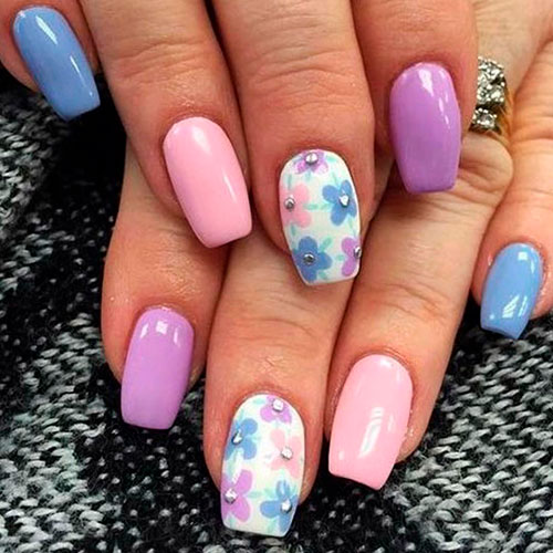 Cute colorful spring nails with an accent floral nail