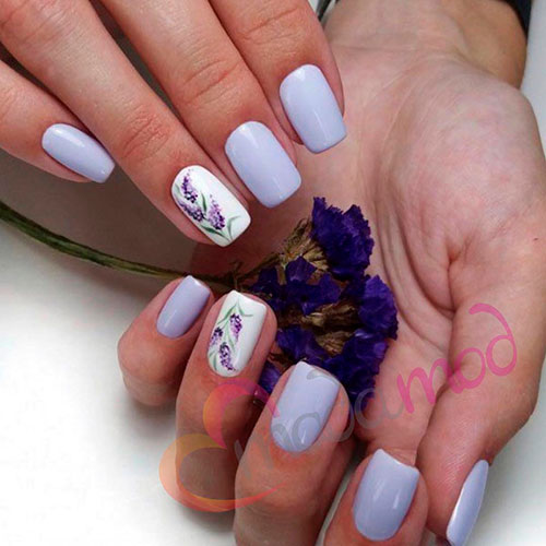 Gorgeous light purple spring nails with accent floral nail
