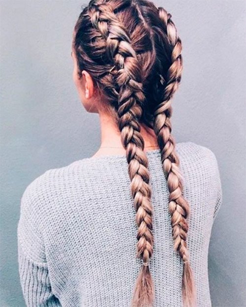 How to style Dutch braid pigtails A girl with Dutch pigtail Braids and gray sweater