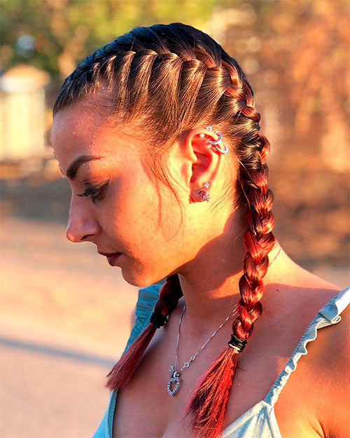 How to style French braid pigtails Stylish girl with French Pigtail Braids and ear earrings