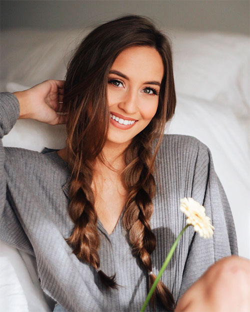 Beautiful girl with basic pigtail braids hairstyle for long hair