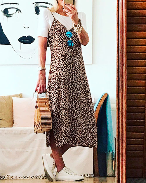 leopard slip dress with a white T-shirt as a top underneath the dress for spring 2019