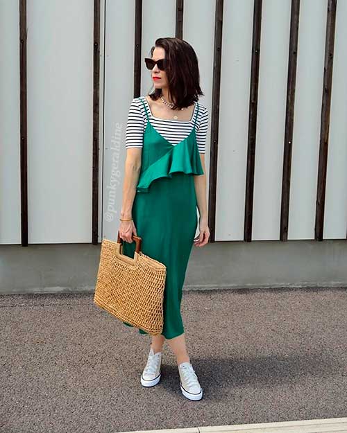 Stunning emerald green slip dress layered over white striped t shirt!