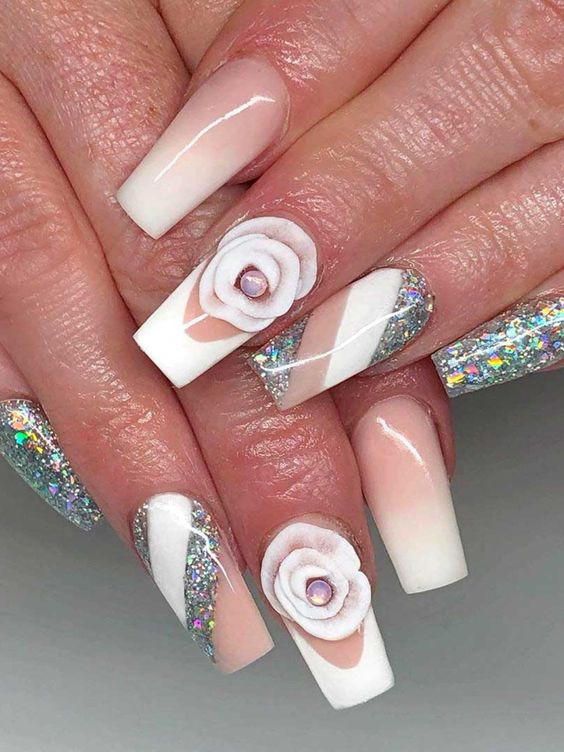 Classy french ombre wedding nails with silver glitter and 3d flower accent nail.