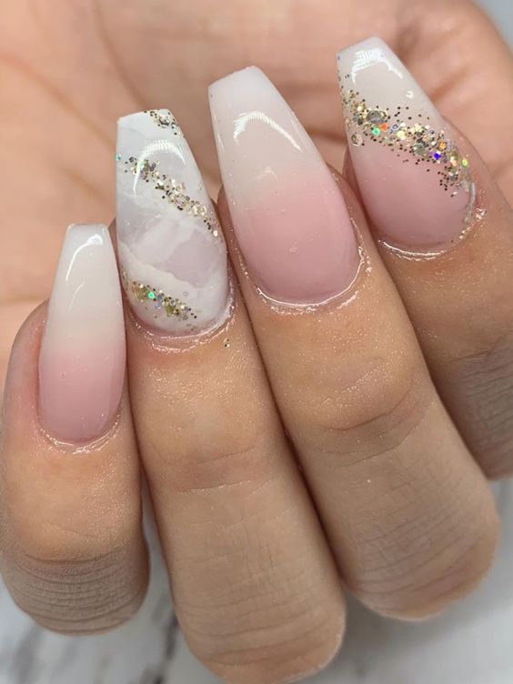 French ombre nails coffin shaped with glitter.