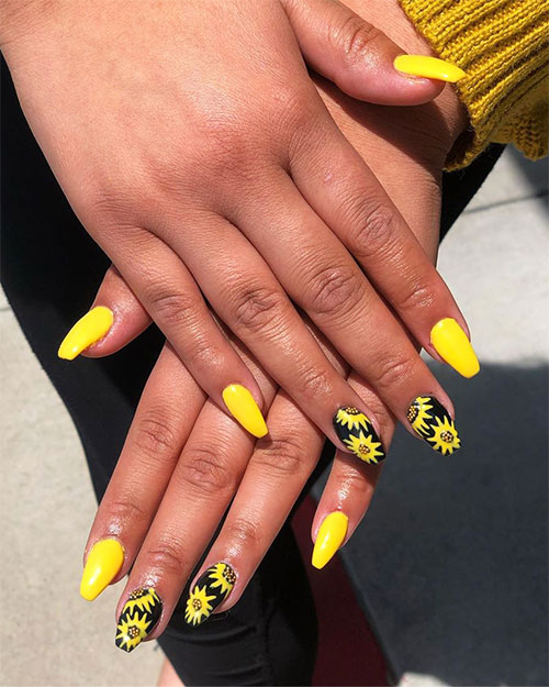 Short coffin yellow nails with a sunflower on black nails for the summertime in 2019