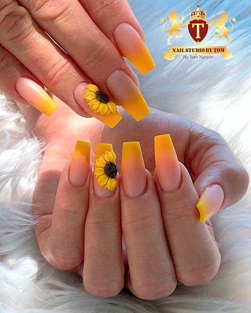 Cute yellow ombre matte nails with accent sunflower nail art design