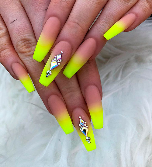 Fancy matte neon yellow ombre nails with an accent nail adorned with rhinestones for summer 2019