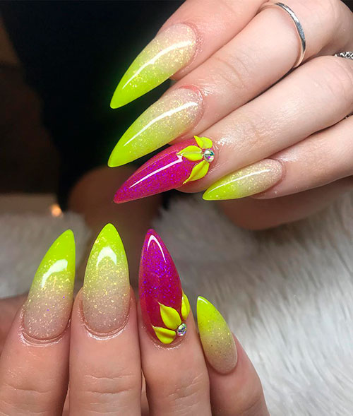 Stilleto shaped neon yellow ombre nails with an accent sunflower nail for summer 2019