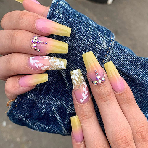 Cute yellow ombre nails with an accent leaf nail for summertime in 2019