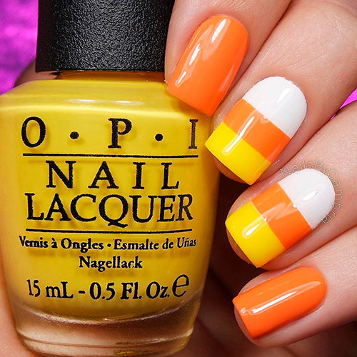 Cute short Halloween candy corn nails 2019 is cute short Halloween nails to wear