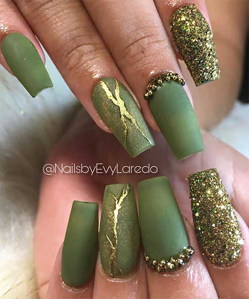 Beautiful olive green coffin shaped nails with gold foil, rhinestones and an accent gold glitter nails for Fall season! Beautiful olive green coffin shaped fall nails with gold foil, rhinestones and an accent gold glitter nails for Fall season!