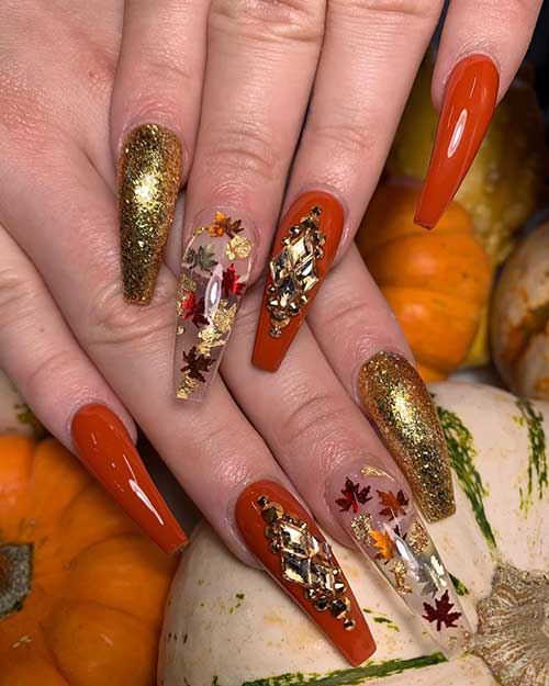 Cute burnt orange, gold foil, leafy foil, and rhinestones Fall nails 2019 design!