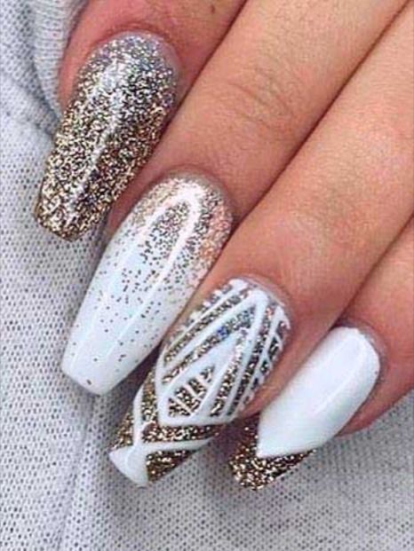 Amazing white winter nails coffin shaped with gold glitter!