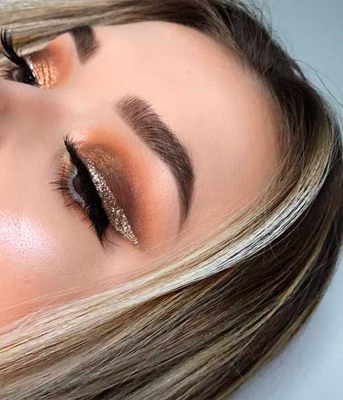 Be ready for the Christmas 2019 with brown Smokey eyes with glitter eyeliner