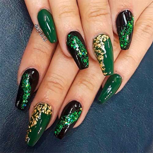 Cute dark green and black nails coffin shaped design with gold foil and green glitter