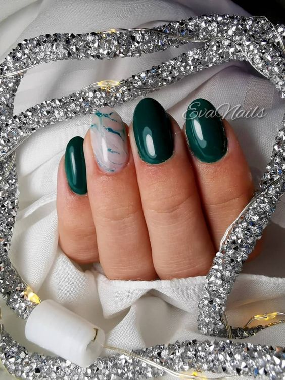 Cute short almond dark green nails with accent marble nail!