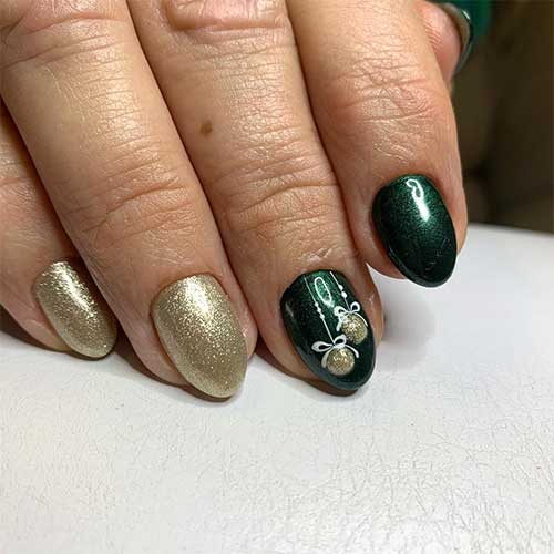 Cute short dark green Christmas nails set with gold glitter!