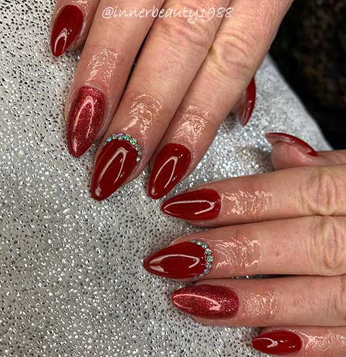 red almond shaped valentine's day nails 2020 with glitter red accent nail and rhinestones