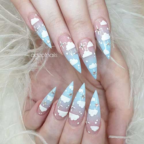 Light blue ombre cloud nails stiletto shaped design