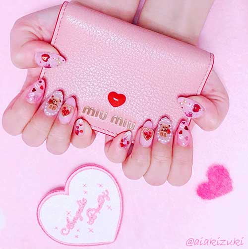 Pink valentines nails almond shaped in 2020 with heart and lips stickers