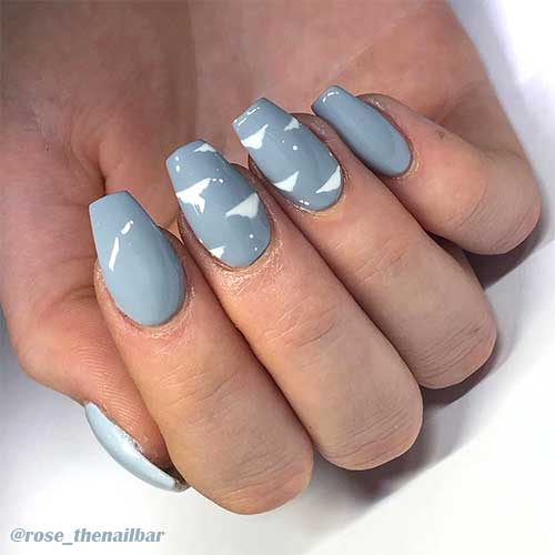 Cute simple coffin shaped light grey cloud nails Cute simple coffin shaped light grey cloud nails