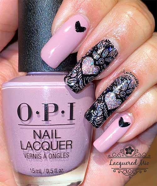 Gorgeous rosy nude valentines day nails 2020 design with negative space stamping over the glitter nails