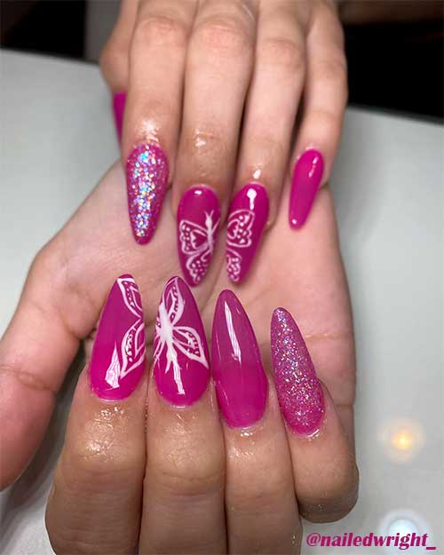 Cute almond pink butterfly acrylic nails 2020 with accent glitter nail for spring season