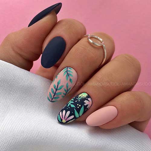 Cute almond spring matte nails 2020 design consists of nude and navy matte nails with flowers and leaves