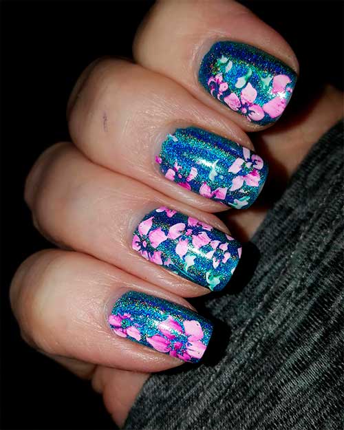 Cute squoval blue spring holographic nails with stamping pink flowers design