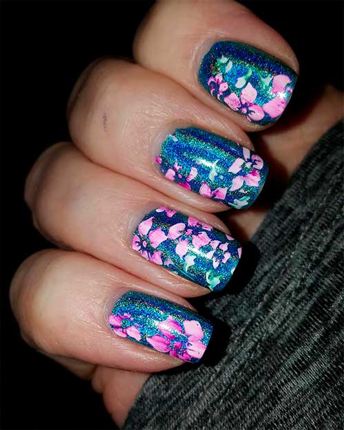 Cute squoval blue holographic spring nails 2020 with stamping pink flowers design Cute squoval blue spring holographic nails with stamping pink flowers design