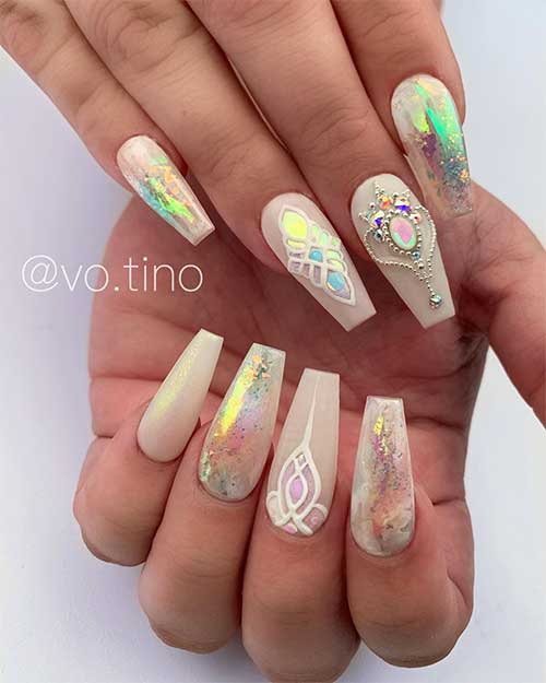 Cute matte nude nails coffin with rhinestones and super opal chrome design!