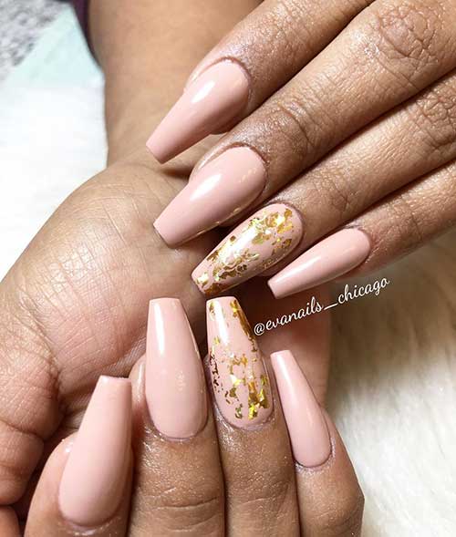 Cute nude coffin nails 2020 design with gold foil on accent nail Cute nude coffin nails 2020 design with gold foil on accent nail