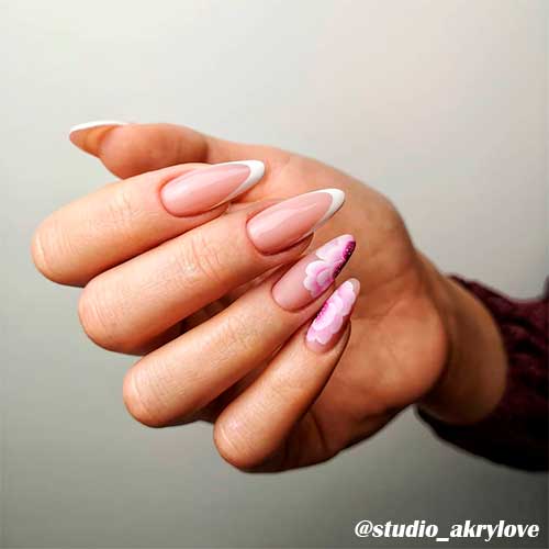 Cute spring French nails 2020 almond shape with white tips and two accent flower acrylic nails