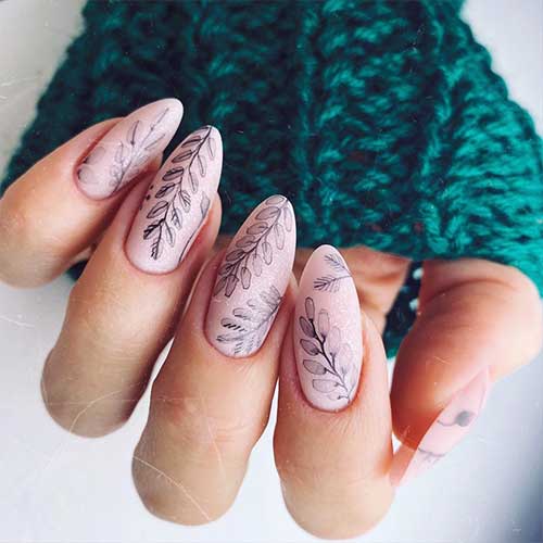 Cute spring color almond nails with leaves on nails