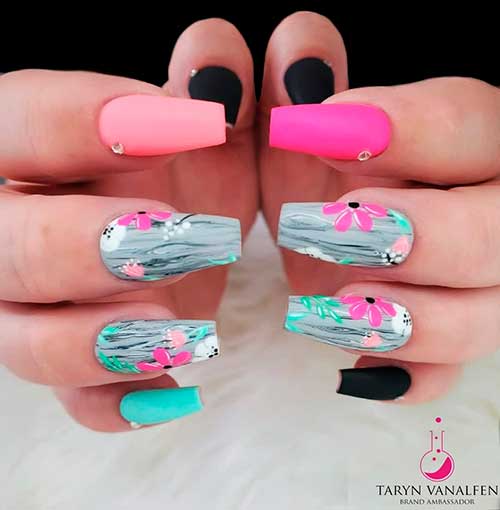 Cute multicolor spring nails with two accent floral coffin nails design! Cute multicolor spring nails with two accent floral coffin nails design!
