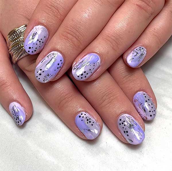 So vibrant round nails colors with glowing ombre purple effect and some black dots for spring 2020 So vibrant round nails colors with glowing ombre purple effect and some black dots for spring 2020