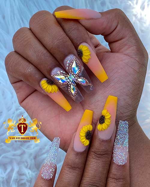 Cute coffin shaped summer yellow ombre nails 2020 with sunflower nails, two rhinestoned butterfly nails and two glitter nails design!