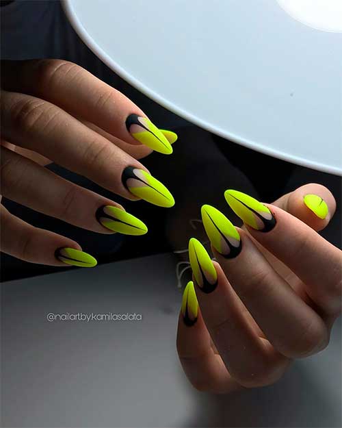Cute neon yellow almond nails with black base and center line design!
