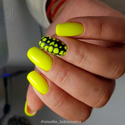 Cute neon yellow square nails with accent black and neon yellow nail design!
