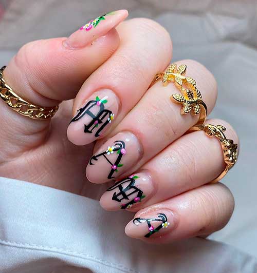 Cute nude color short mothers day nails with floral nail art