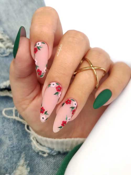 Dark Green Nails with Flowers Long almond matte dark green nails with flowers on nude pink accent nails for spring season