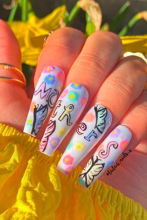 Try mother’s day nail designs like these colorful nails with butterfly nail art!