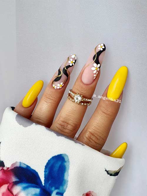 Yellow Nails with Daisy Flowers and Black Swirls on Two Accent Nude Nails Long Almond-Shaped Yellow Nails with Daisy Flowers and Black Swirls on Two Accent Nude Nails