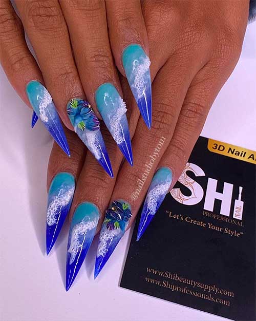 Cute stiletto shaped Ocean Nails 2021 with Floating Lotus Flower on accent nail for summer time